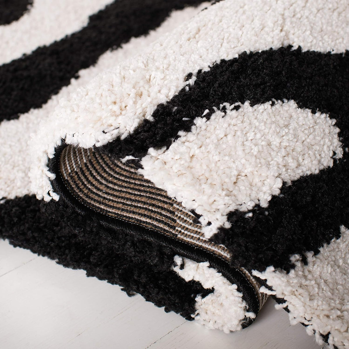 SAFAVIEH Florida Shag Collection Area Rug - 8'6" x 12', Ivory & Black, Zebra Print Design, Non-Shedding & Easy Care, 1.2-inch Thick Ideal for High Traffic Areas in Living Room, Bedroom (SG452-1290)